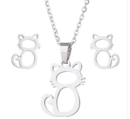 Silver cat necklace and matching earrings jewelry set on white background