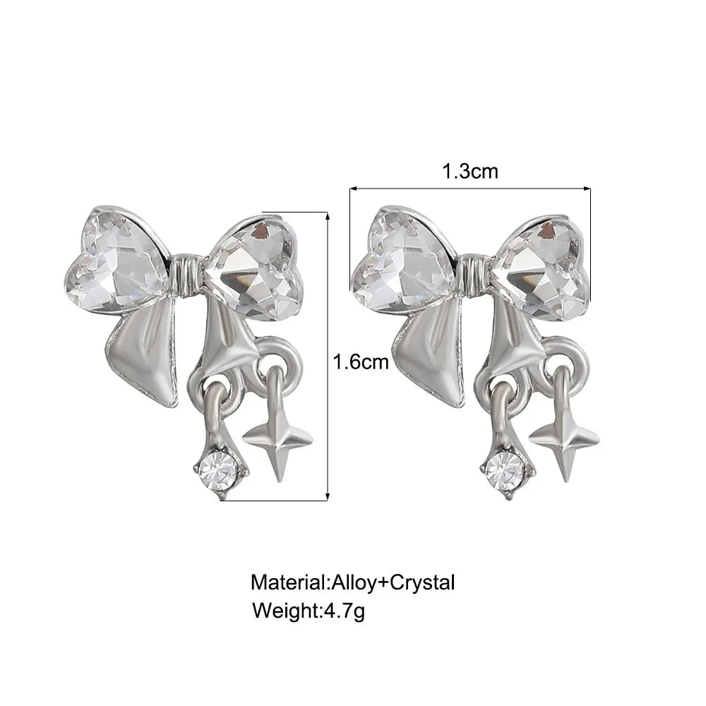 Crystal bow stud earrings with star and drop charms, silver tone alloy, 1.6x1.3cm, elegant jewelry