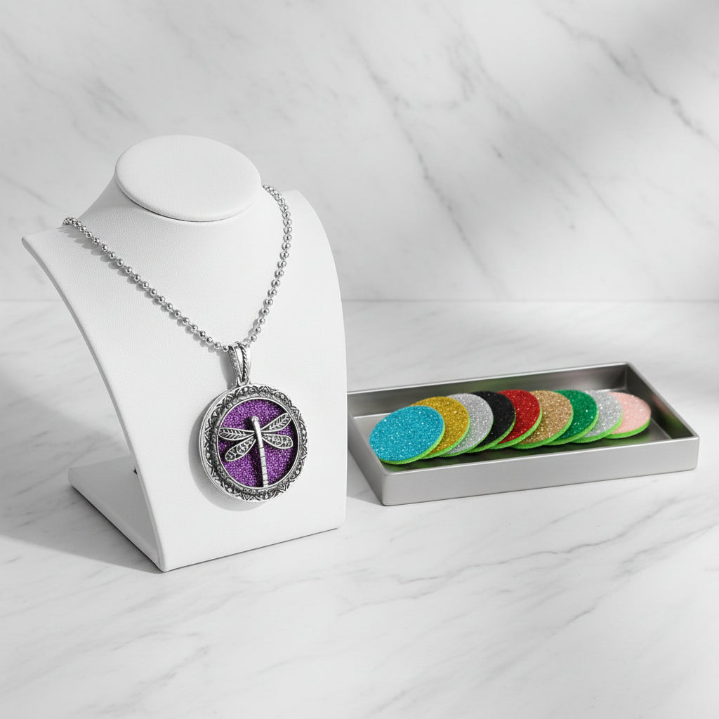Dragonfly pendant necklace with colorful refills on a white background
