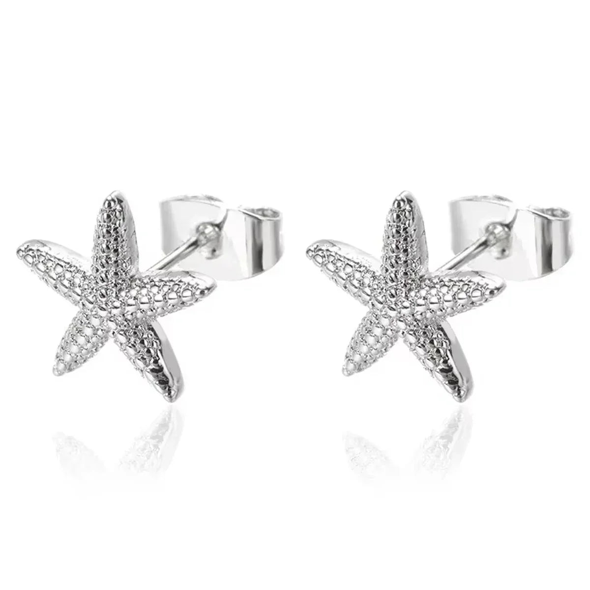 Silver starfish stud earrings with textured surface, elegant designer jewelry