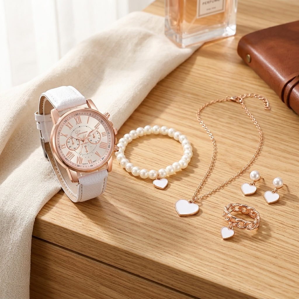 Watch, bracelet, necklace, and ring on a wooden surface with a neutral background